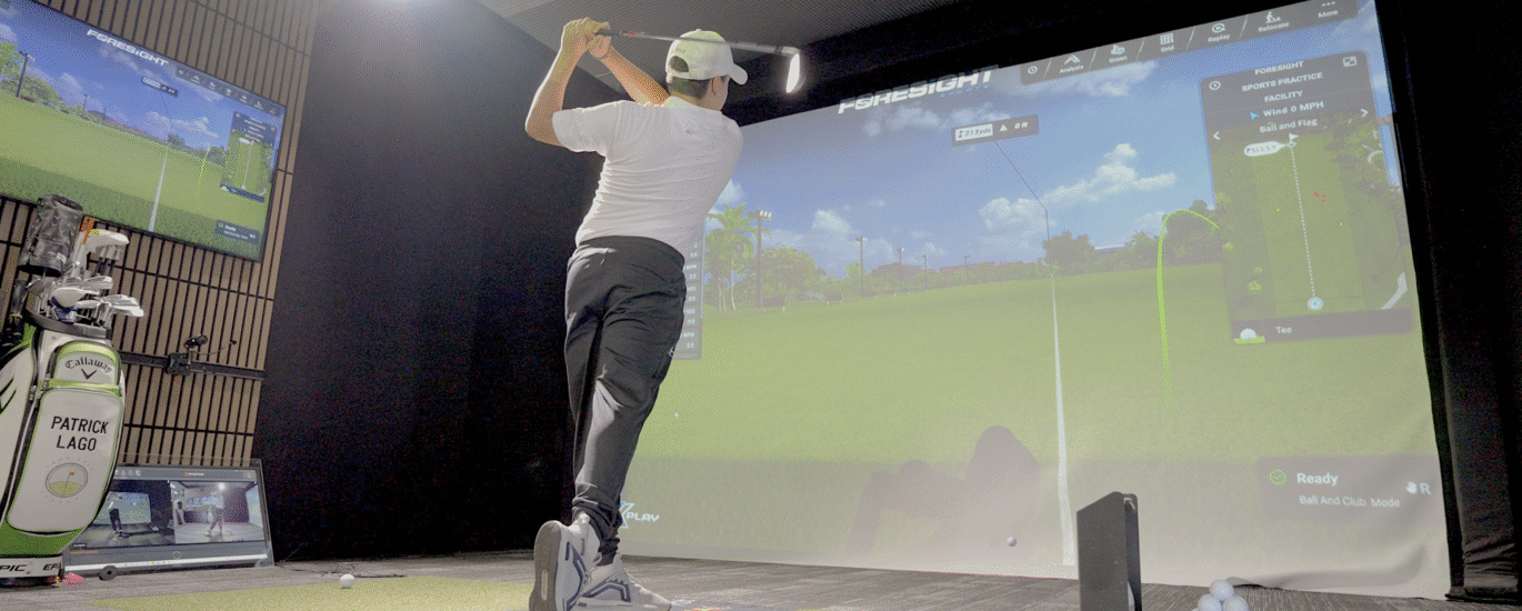 High-performance junior golfer swinging with high frame-rate video analysis, Swing Catalyst dual motion plates, and a Foresight Sports GCQuad Max launch monitor at Lago Golf