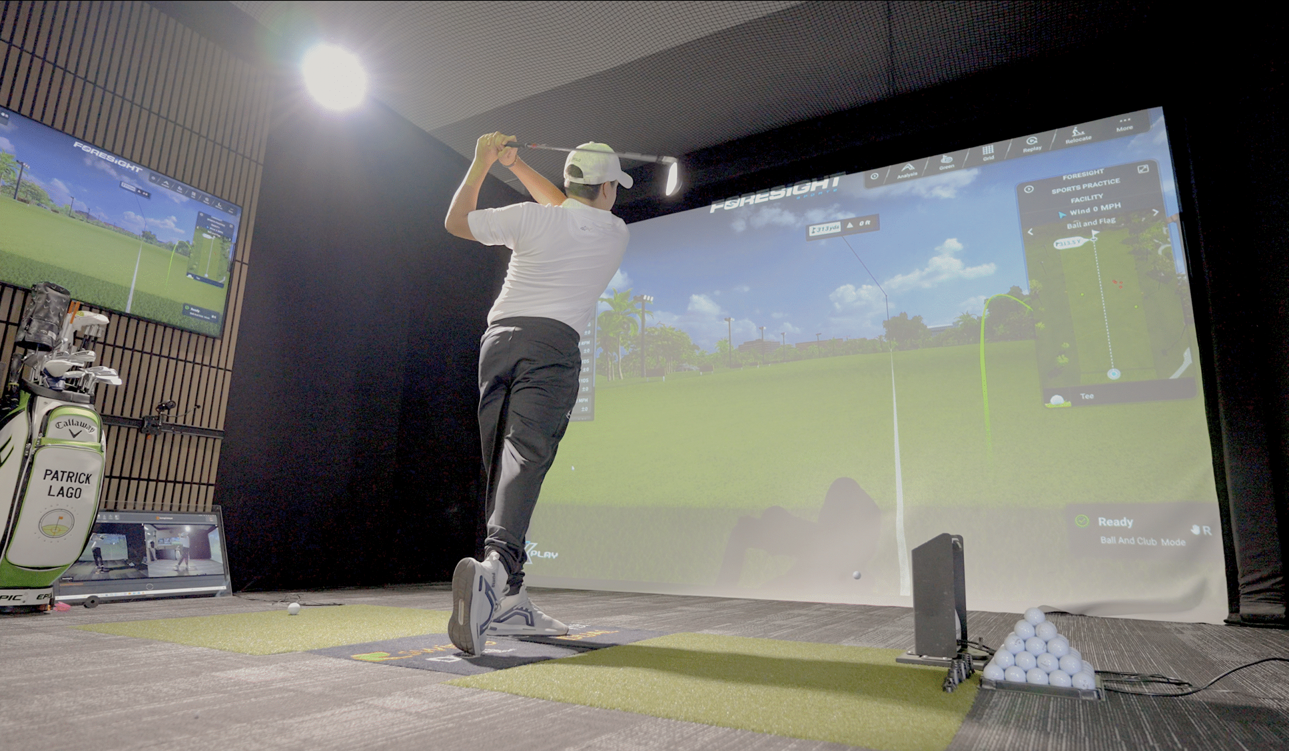High-performance junior golfer swinging with high frame-rate video analysis, Swing Catalyst dual motion plates, and a Foresight Sports GCQuad Max launch monitor at Lago Golf