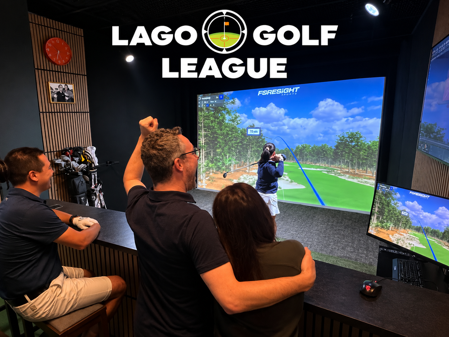 Golfers competing in the Lago Golf League indoor simulator competition in Port Coquitlam, BC