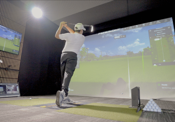 High-performance junior golfer swinging with high frame-rate video analysis, Swing Catalyst dual motion plates, and a Foresight Sports GCQuad Max launch monitor at Lago Golf