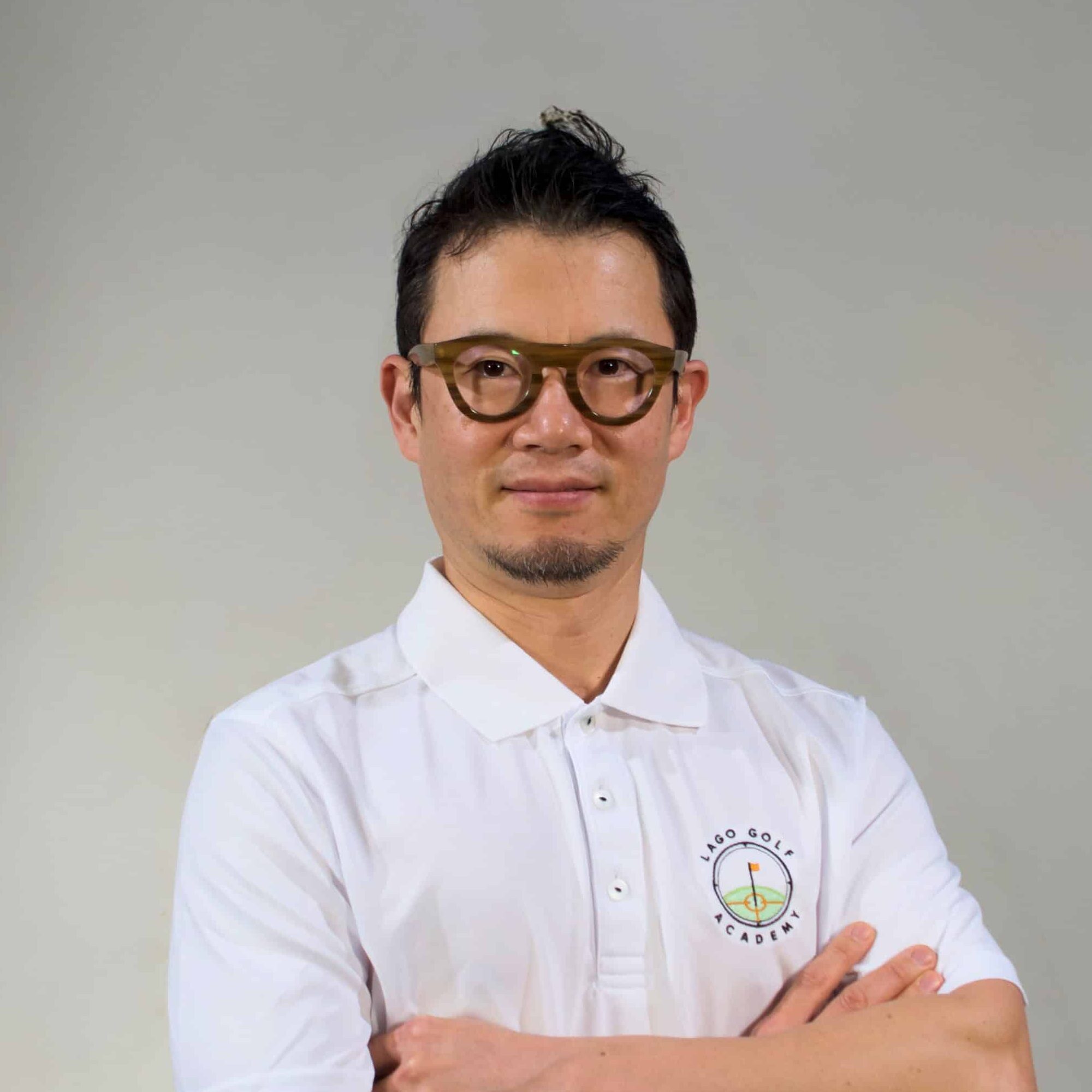 Headshot of JT Chung, golf instructor at Lago Golf