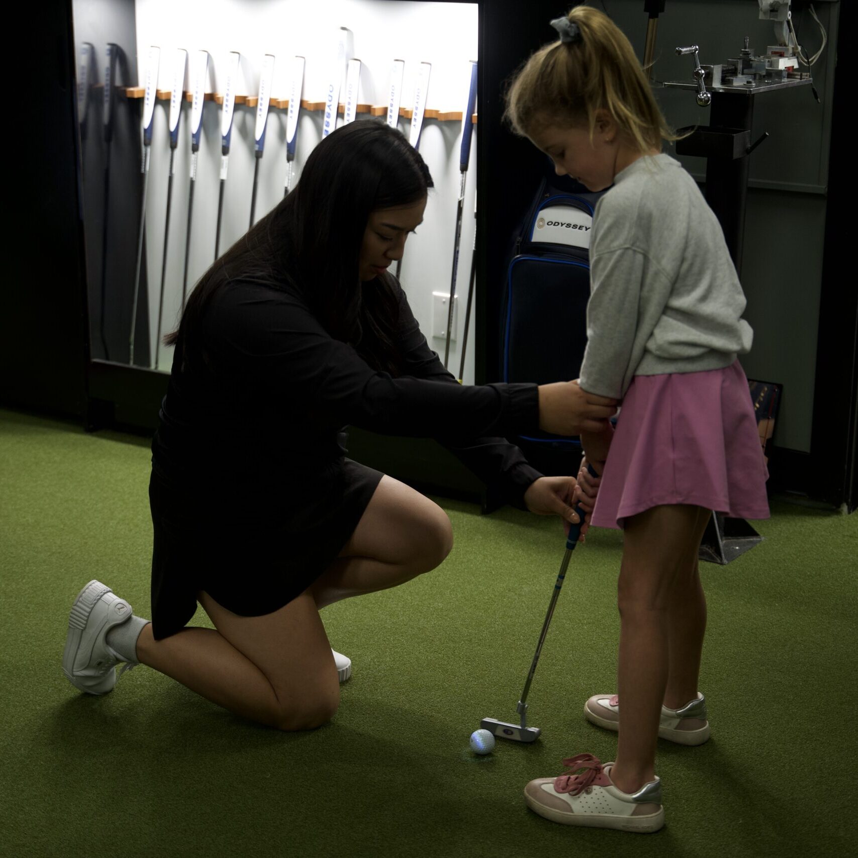 girl golf lesson
