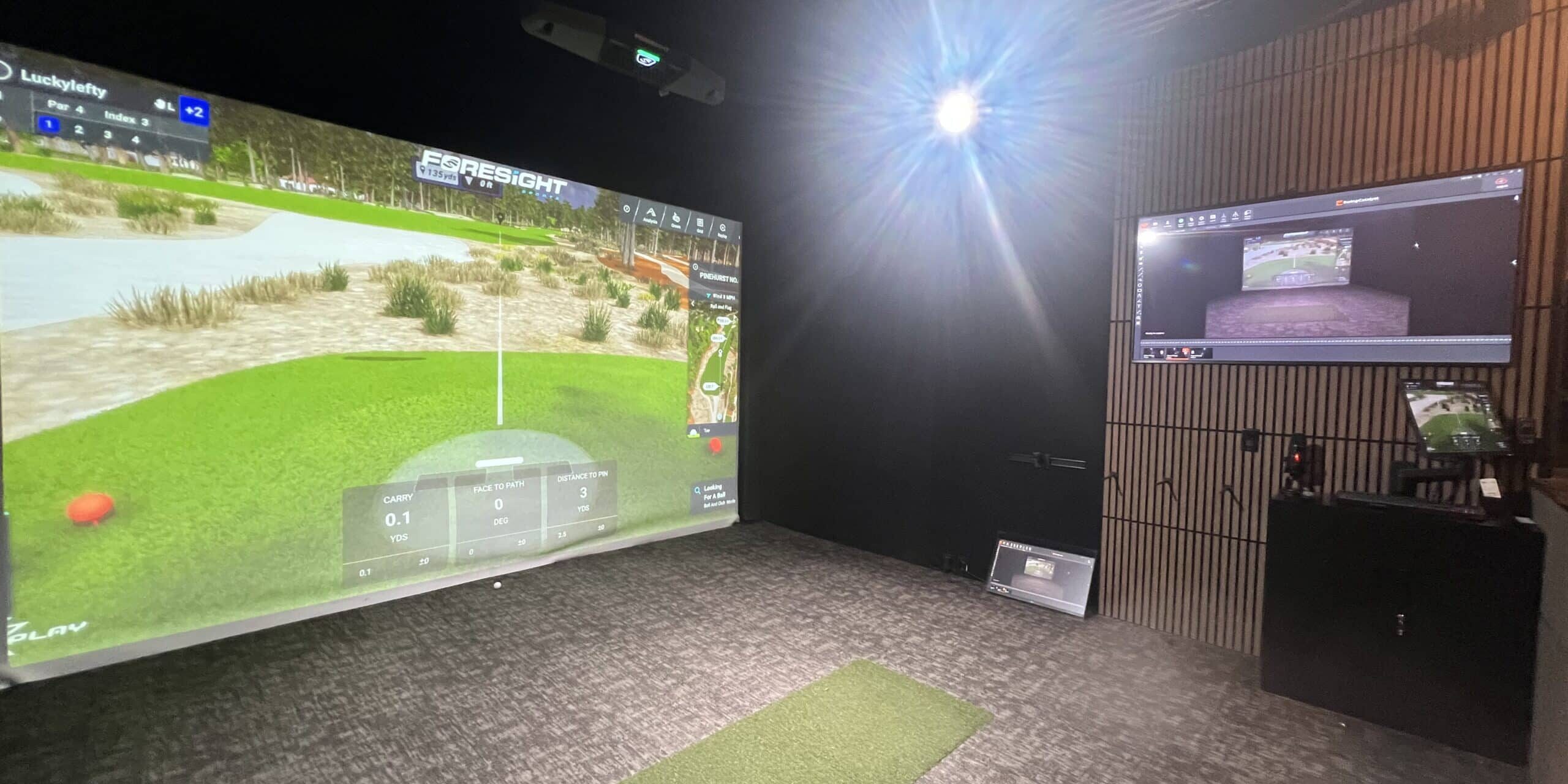 Weir Bay indoor golf simulator at Lago Golf in Port Coquitlam, BC